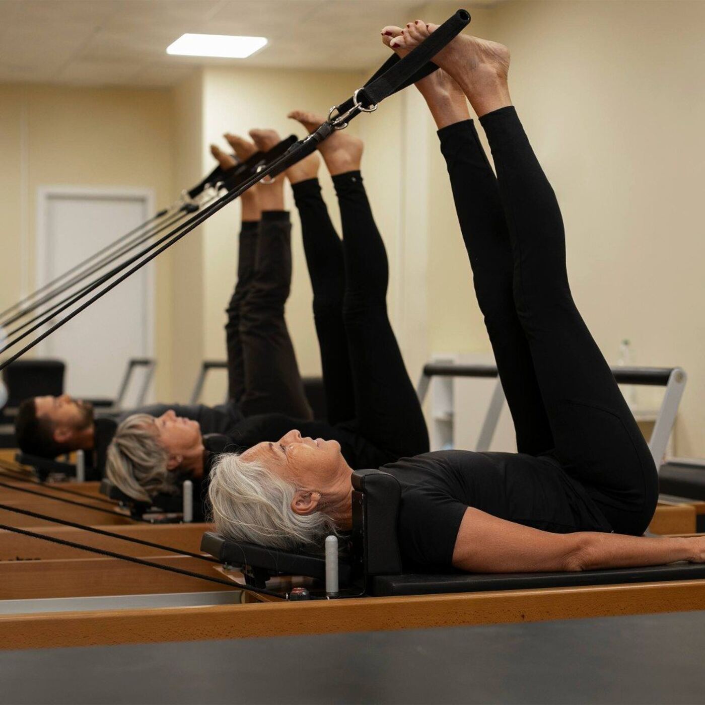 Clase grupal en el Reformer